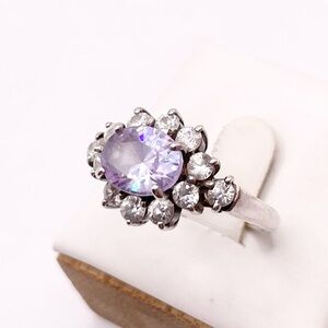Elegant Silver and Purple Gemstone Ring
